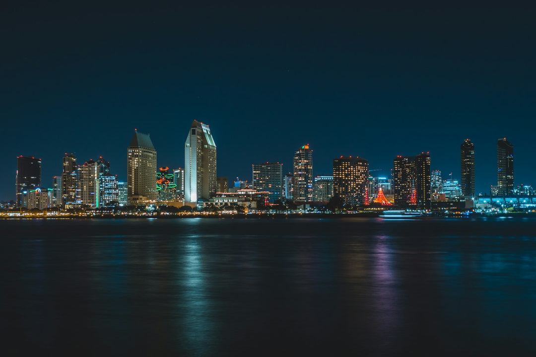 The San Diego skyline across the bay at night