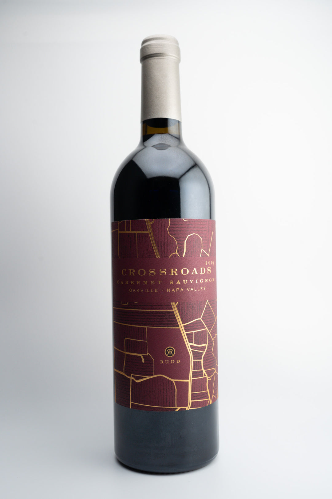 A bottle of 2019 Crossroads by Rudd Cabernet Sauvignon with a label showcasing a map of the Oakville area in Napa Valley.