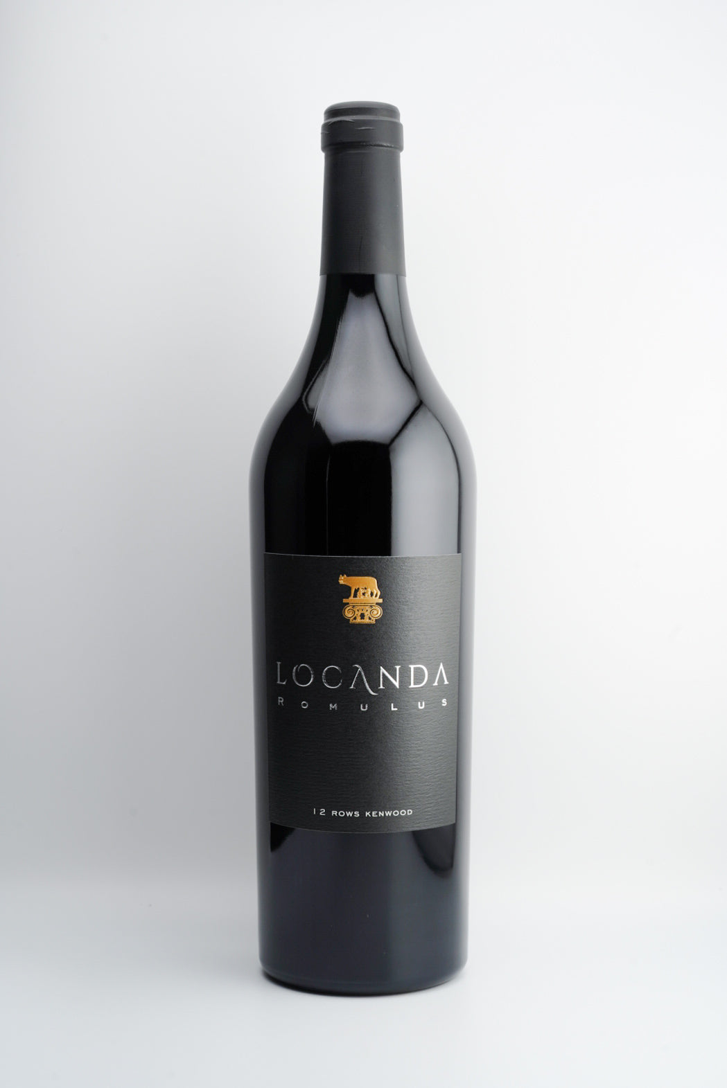 A bottle of 2019 Locanda Estate 'Romulus' wine, with a dark label and gold accents on the label.
