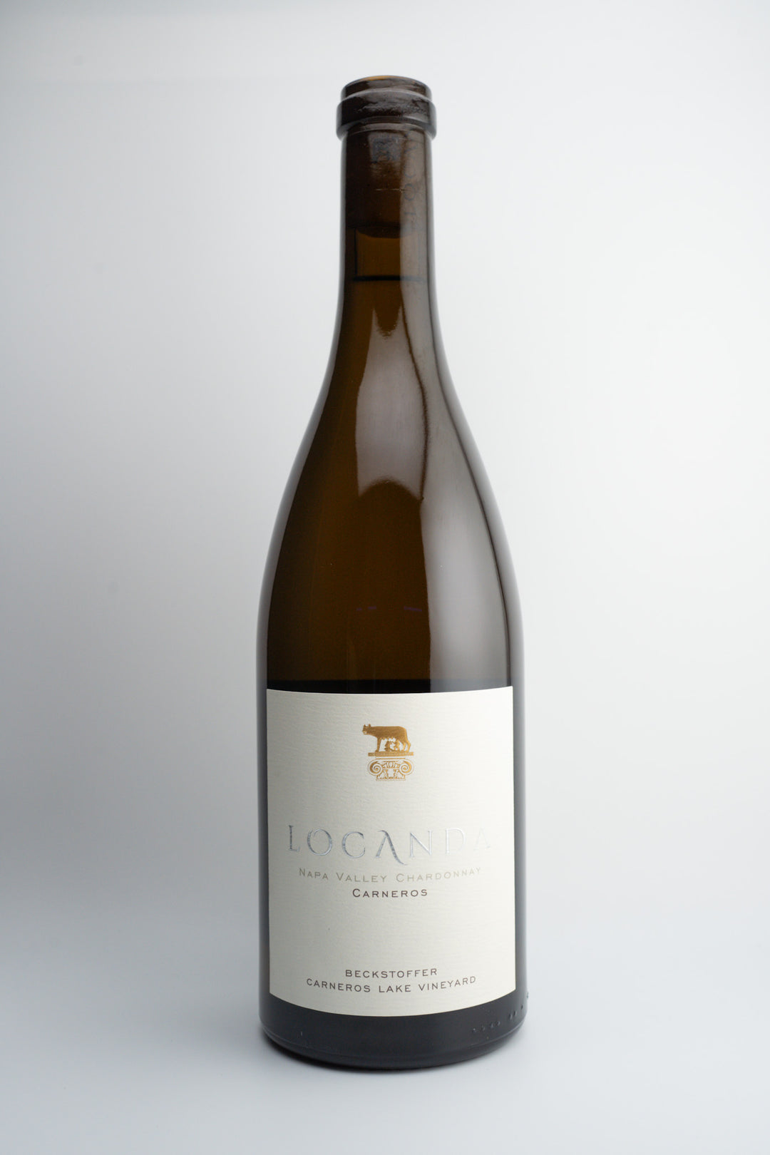 A bottle of 2020 Locanda Estate Chardonnay Beckstoffer Carneros Lake Vineyard, Sonoma Valley, California wine with a plain background.