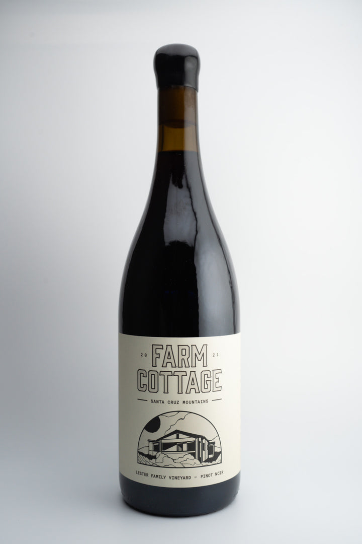 A bottle of 2021 Farm Cottage Wines Pinot Noir with a label showcasing the winery&
