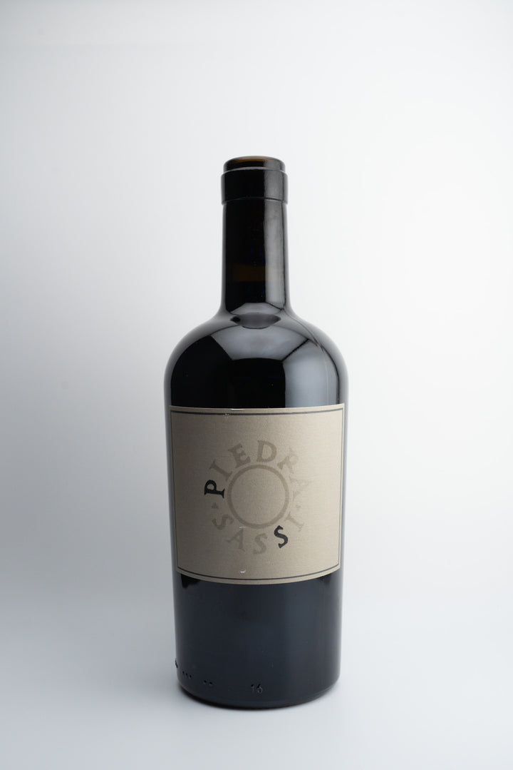 A bottle of 2021 Piedrasassi 'PS' Syrah wine with a label that includes the brand name and 'Santa Barbara County, California'.