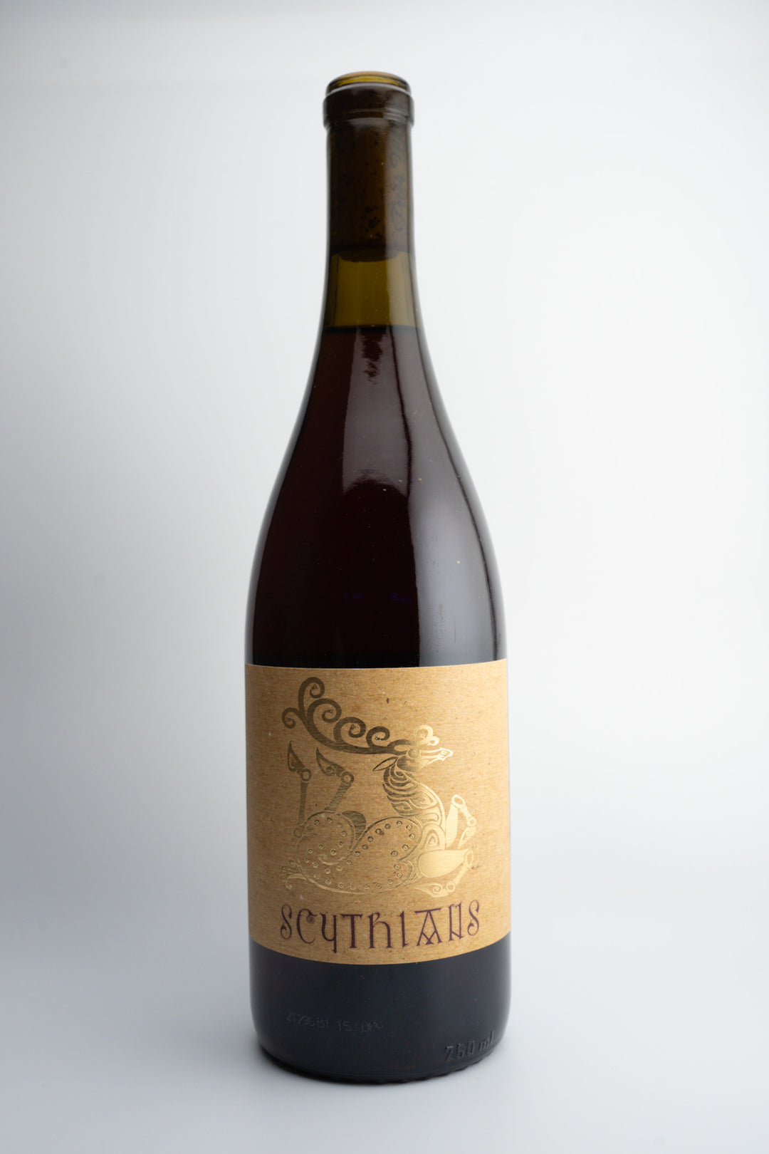 A bottle of 2021 Scythians Red Blend wine with a label that has an engraving of a person and text, indicating it is from Cucamonga Valley, California.
