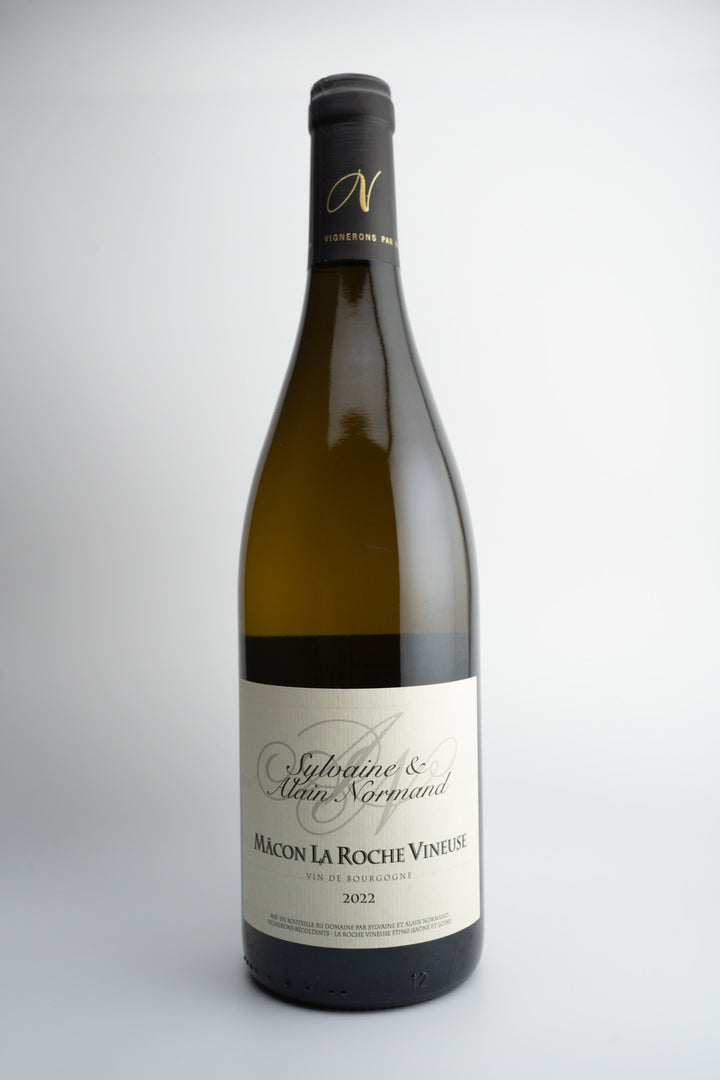 A bottle of 2022 Sylvaine et Alaine Normand La Roche-Vineuse white wine, with a label primarily in white and gray tones, and the text &