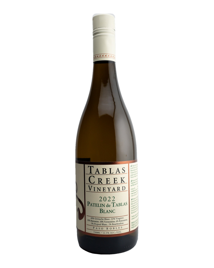 A bottle of 2022 Tablas Creek Patelin de Tablas Blanc wine with a white label, displaying the brand, variety, and vintage information.