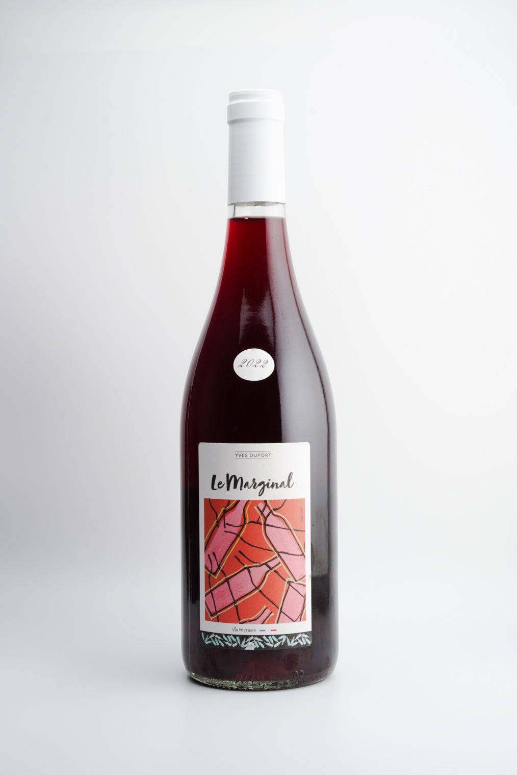 A bottle of 2022 Yves Duport 'Le Marginal', Savoie, Vin de France wine with a label showing a geometric pattern in red and orange tones.