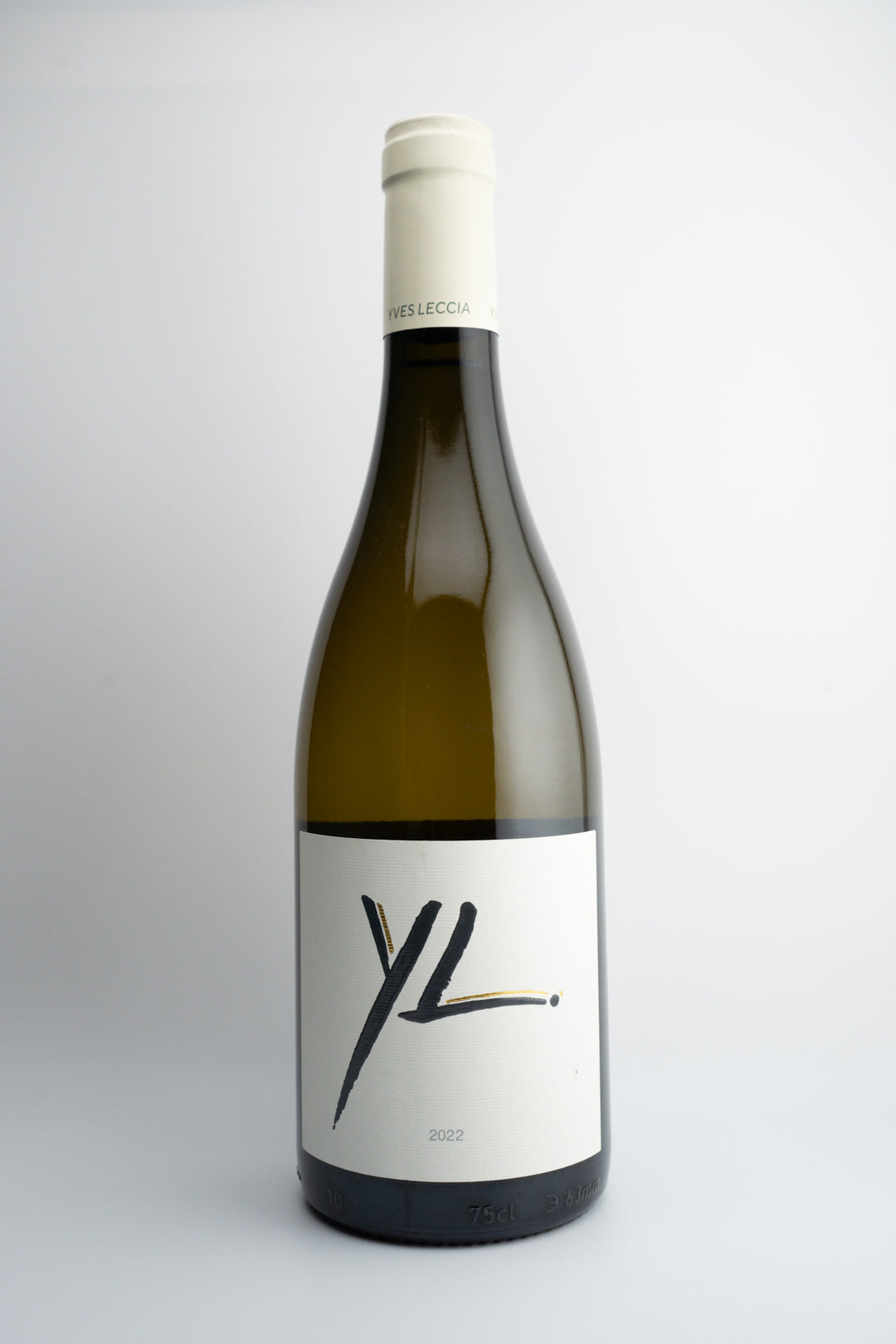 Bottle of 2022 Yves Leccia 'YL' Ile de Beaête Blanc white wine with a plain label and a cap on top, against a white background.