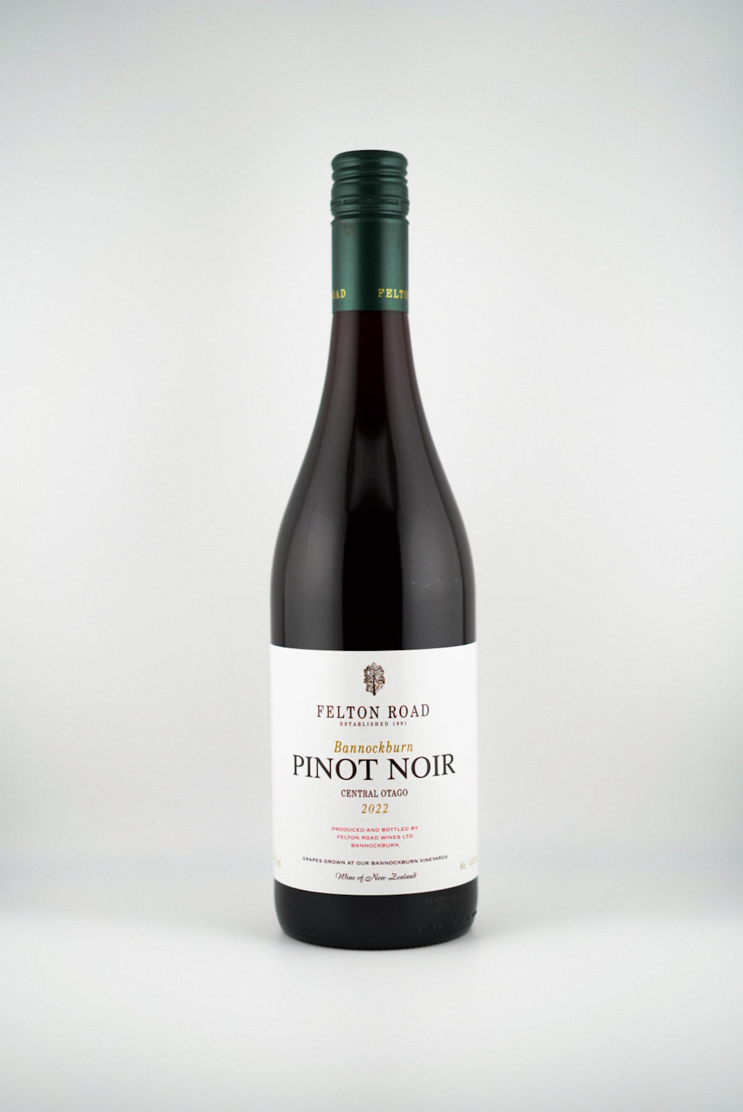Bottle of Felton Road Pinot Noir wine on a white background