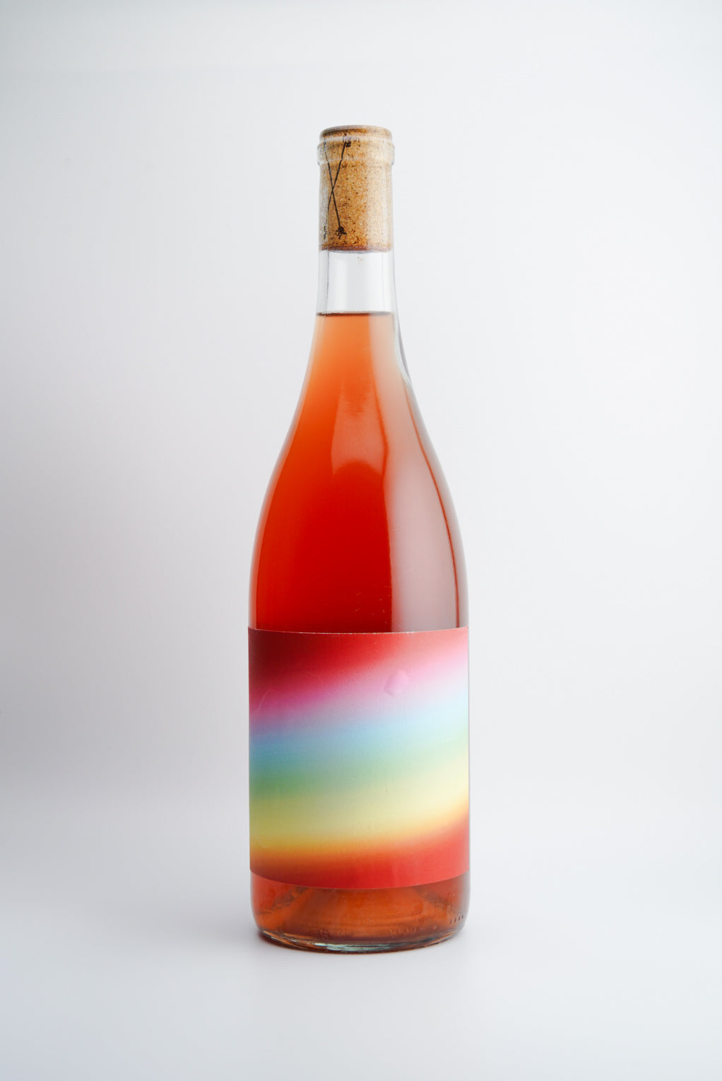 A bottle of 2023 Las Jaras 'Superbloom' wine with a colorful label.