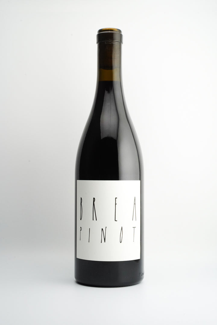 A bottle of BREA Wine Co. Pinot Noir with a label that includes the wine variety and 'Massa Vineyard, Central Coast, California'.