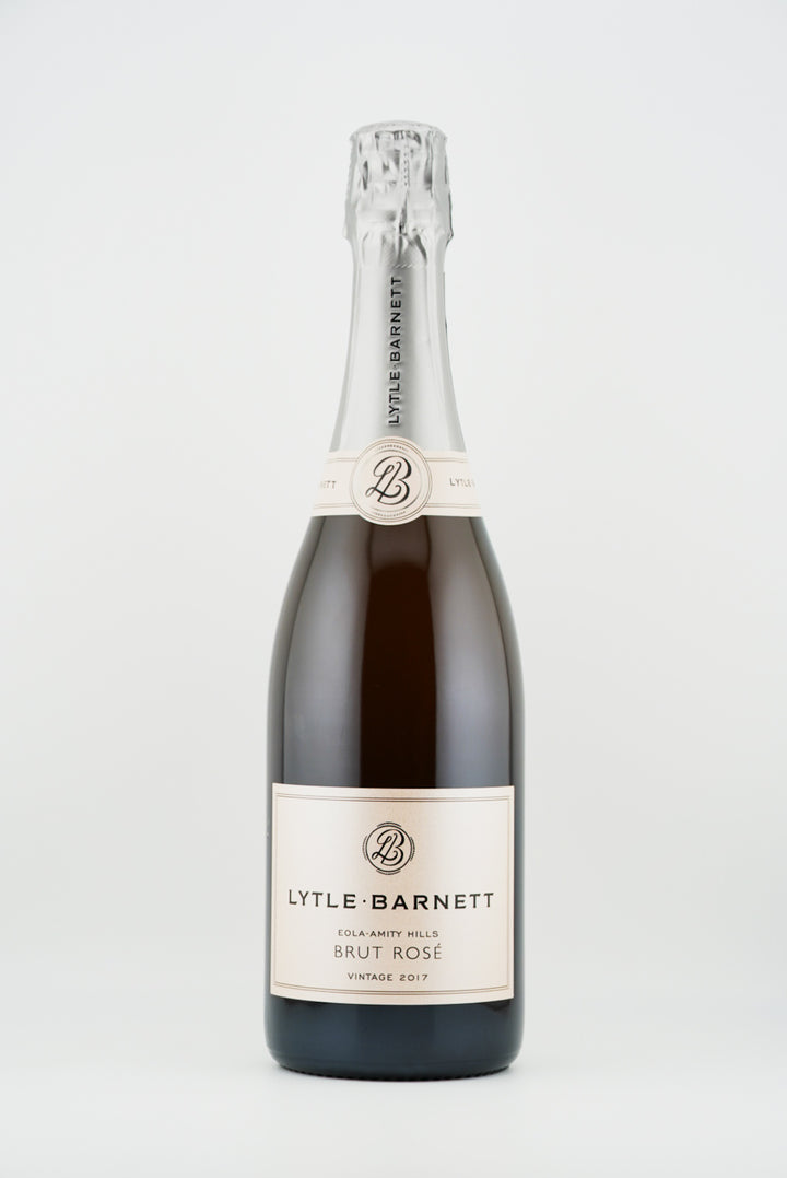 Bottle of Lyttle-Barnett Brut Rosé sparkling wine on a white background