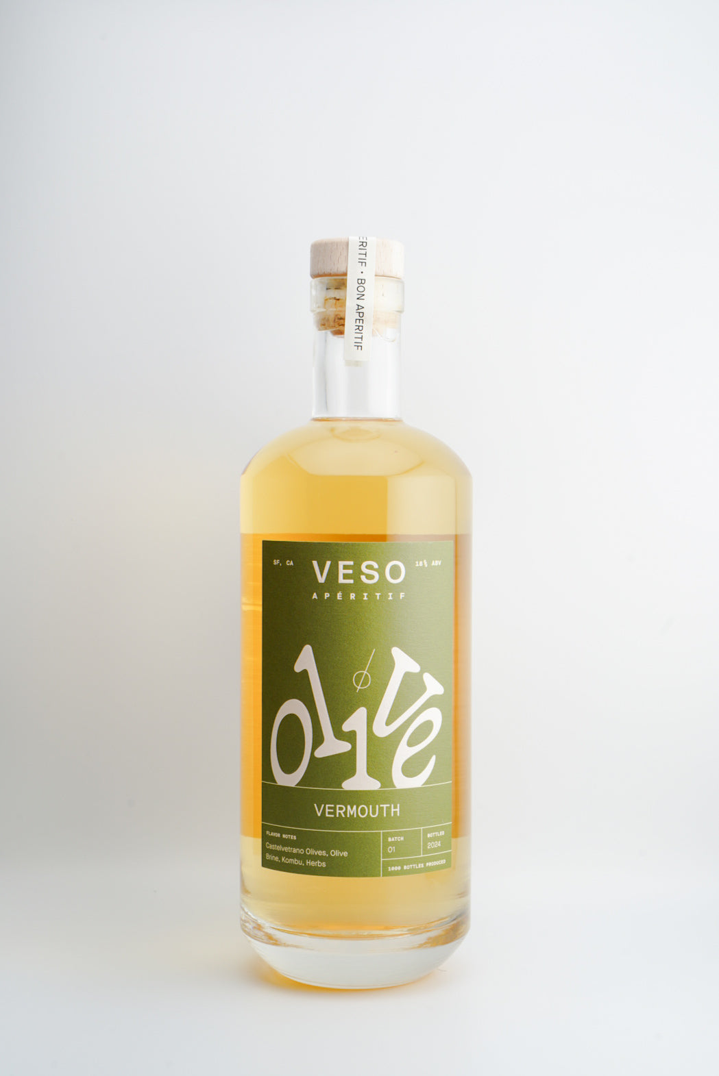 A bottle of VESO Olive Vermouth with a label that has Korean text and an olive leaf symbol, indicating the flavor and origin of the product.