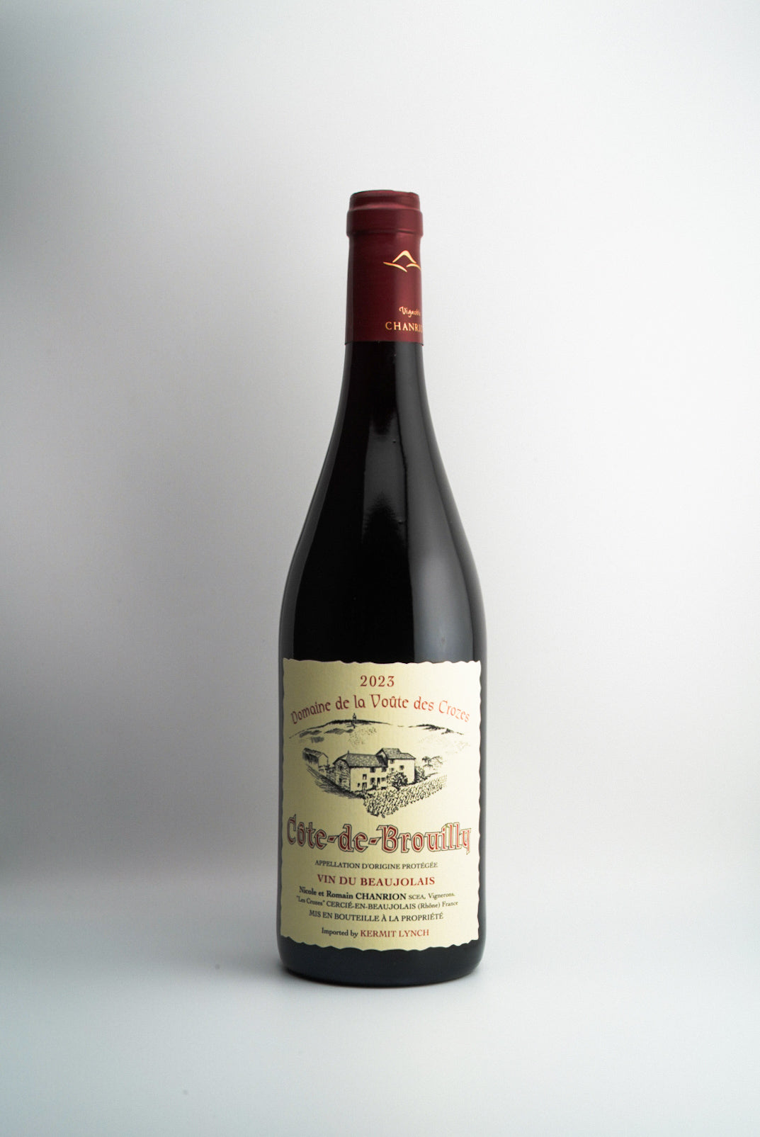 Wine bottle with a label on a white background