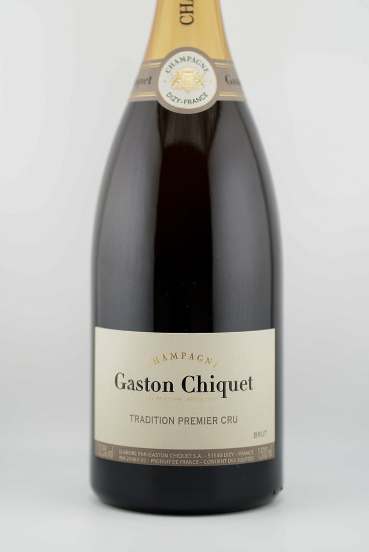 Bottle of Gaston Chiquet champagne on a white background