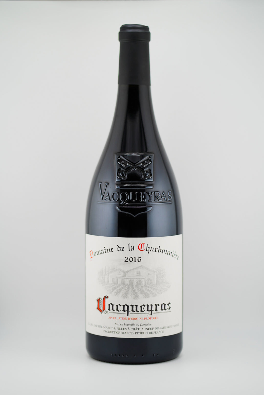 Vacqueyras wine bottle on a white background