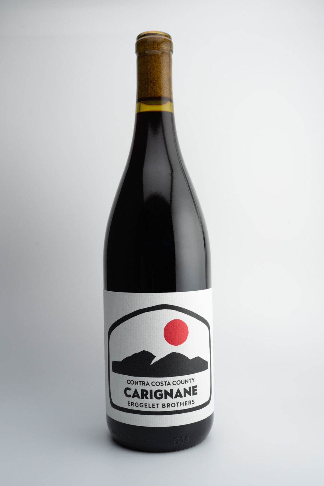 A bottle of 2021 Erggelet Brothers Old Vine Carignane wine with a label showing the Contra Costa County branding and a red circle indicating the vineyard location.