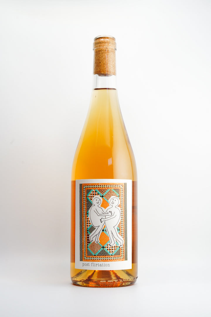 A bottle of Martha Stoumen Post Flirtation Orange, California, Non Vintage wine with a beige label featuring an illustration.