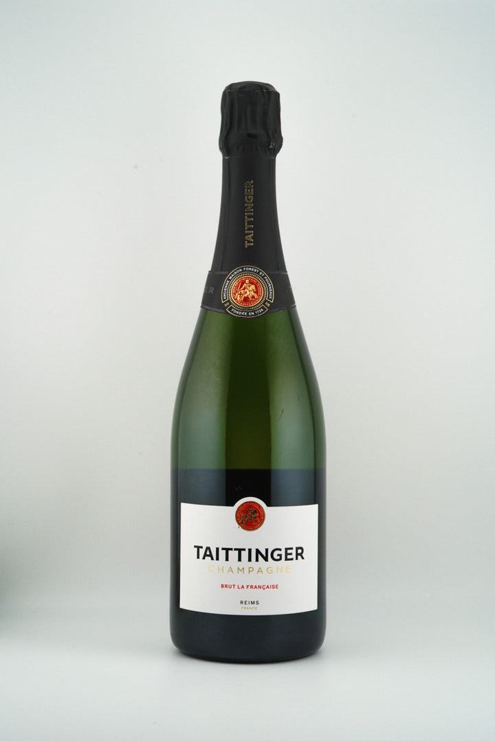Bottle of Taittinger champagne on a white background